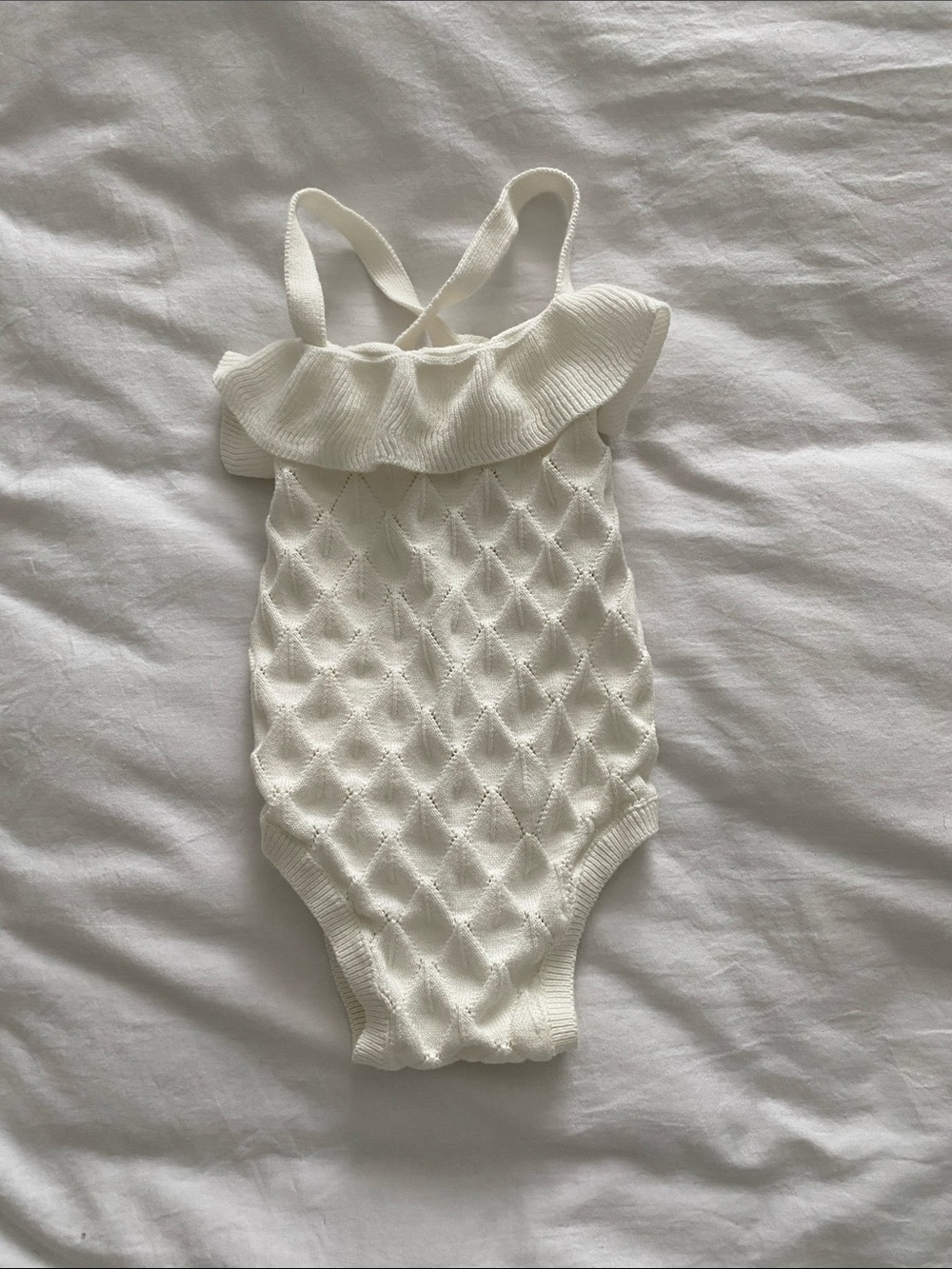 Cream Knit Baby One-Piece Romper with Ruffle Trim